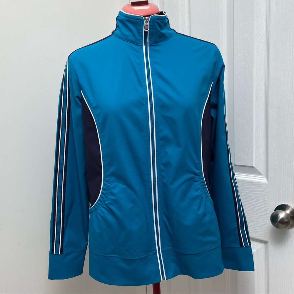 SB Active women blue, white piping detailing, zipper front closure. Size M. Used